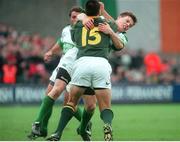 19 November 2000; Brian O'Driscoll, Ireland, attempts to stop Thinus Delport, South Africa. International friendly, Ireland v South Africa, Lansdowne Road, Dublin. Picture credit: Ray Lohan / SPORTSFILE