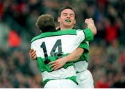 19 November 2000; Denis Hickie, 14, Ireland, celebrates with team-mate Rob Henderson after scoring a try. International friendly, Ireland v South Africa, Lansdowne Road, Dublin. Picture credit: Aoife Rice / SPORTSFILE *** Local Caption *** 19 November 2000; Ireland's Denis Hickie, (14) celebrates after scoring his sides try with team-mate Rob Henderson. International friendly, Ireland v South Africa, Lansdowne Road, Dublin. Picture credit: Aoife Rice / SPORTSFILE