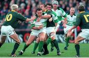 19 November 2000; Rob Henderson, Ireland, is tackled by Corne Krige, centre, and Percy Montgomery, 10, South Africa. International friendly, Ireland v South Africa, Lansdowne Road, Dublin. Picture credit: Matt Browne / SPORTSFILE