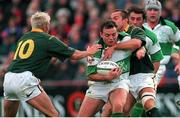 19 November 2000; Rob Henderson, Ireland, is tackled by Corne Krige, centre, and Percy Montgomery, 10, South Africa. International friendly, Ireland v South Africa, Lansdowne Road, Dublin. Picture credit: Matt Browne / SPORTSFILE