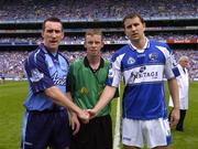 17 July 2005; Dublin captain Paddy Christie, left, shakes hands with Laois captain Kevin Fitzpatrick, in the company of referee Joe McQuillan. Bank of Ireland Leinster Senior Football Championship Final, Dublin v Laois, Croke Park, Dublin. Picture credit; Brian Lawless / SPORTSFILE