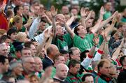 20 July 2005; Glentoran supporters cheer on their team during the game. UEFA Champions League, First Qualifying Round, Second Leg, Shelbourne v Glentoran, Tolka Park, Dublin. Picture credit; David Maher / SPORTSFILE