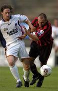 22 July 2005; Tony Grant, Bohemians, is tackled by Simon Webb, Drogheda United. eircom League, Premier Division, Bohemians v Drogheda United, Dalymount Park, Dublin. Picture credit; David Maher / SPORTSFILE