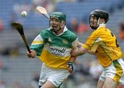 23 July 2005; Aidan Hanrahan, Offaly, is tackled by Michael Kettle, Antrim. Guinness All-Ireland Senior Hurling Championship, Relegation Section, Semi-Final, Offaly v Antrim, Croke Park, Dublin. Picture credit; Matt Browne / SPORTSFILE