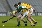 23 July 2005; Michael Cordial, Offaly, is tackled by Jim Connolly, Antrim. Guinness All-Ireland Senior Hurling Championship, Relegation Section, Semi-Final, Offaly v Antrim, Croke Park, Dublin. Picture credit; Matt Browne / SPORTSFILE