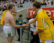 23 July 2005; Brian Whelahan, Offaly, is congratulated by Jim Connolly, Antrim, after the final whistle. Guinness All-Ireland Senior Hurling Championship, Relegation Section, Semi-Final, Offaly v Antrim, Croke Park, Dublin. Picture credit; Matt Browne / SPORTSFILE