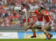 23 July 2005; Sean Cavanagh, Tyrone, in action against Enda McNulty and Paul McGrane, right, Armagh. Bank of Ireland Ulster Senior Football Championship Final Replay, Tyrone v Armagh, Croke Park, Dublin. Picture credit; Brendan Moran / SPORTSFILE