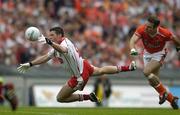 23 July 2005; Sean Cavanagh, Tyrone, in action against Enda McNulty, Armagh. Bank of Ireland Ulster Senior Football Championship Final Replay, Tyrone v Armagh, Croke Park, Dublin. Picture credit; Brendan Moran / SPORTSFILE