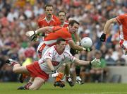 23 July 2005; Sean Cavanagh, Tyrone, in action against Enda McNulty, Armagh. Bank of Ireland Ulster Senior Football Championship Final Replay, Tyrone v Armagh, Croke Park, Dublin. Picture credit; Matt Browne / SPORTSFILE