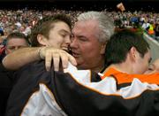 23 July 2005; Armagh manager Joe Kernan hugs his 2 sons Stephen, left, and Aaron, after the final whistle. Bank of Ireland Ulster Senior Football Championship Final Replay, Tyrone v Armagh, Croke Park, Dublin. Picture credit; Brendan Moran / SPORTSFILE