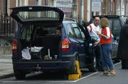 23 July 2005; Armagh and Tyrone fans wait to have their cars unclamped on Mountjoy Square after attending the game. Bank of Ireland Ulster Senior Football Championship Final Replay, Tyrone v Armagh, Croke Park, Dublin. Picture credit; Brendan Moran / SPORTSFILE