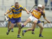 24 July 2005;  Clare's Colin Lynch supported by teammate David Hoey, in action against Redmond Barry, Wexford. Guinness All-Ireland Senior Hurling Championship Quarter-Final, Wexford v Clare, Croke Park, Dublin. Picture credit; Damien Eagers / SPORTSFILE