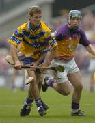 24 July 2005; Brian O'Connell, Clare, in action against Declan Ruth and Paul Carley, right, Wexford. Guinness All-Ireland Senior Hurling Championship Quarter-Final, Wexford v Clare, Croke Park, Dublin. Picture credit; Damien Eagers / SPORTSFILE