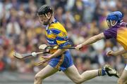 24 July 2005; Niall Gilligan, Clare, is tackled by Diarmuid Lyng, Wexford. Guinness All-Ireland Senior Hurling Championship Quarter-Final, Wexford v Clare, Croke Park, Dublin. Picture credit; Brendan Moran / SPORTSFILE