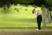 24 July 2005; Tara Delaney, Ireland, plays her second shot from the rough off the 8th fairway during the Women's Irish Open Strokeplay Championship. Hermitage Golf Club, Lucan, Co. Dublin. Picture credit; Matt Browne / SPORTSFILE