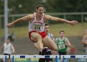 24 July 2005; Antoine Burke, Crusaders A.C., clears the final hurdle on his way to winning the Men's 400m Hurdles during the AAI National Track and Field Championships. Morton Stadium, Santry, Dublin. Picture credit; Pat Murphy / SPORTSFILE