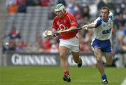 24 July 2005; Niall McCarthy, Cork, is dispossessed by Eoin Kelly, Waterford. Guinness All-Ireland Senior Hurling Championship Quarter-Final, Cork v Waterford, Croke Park, Dublin. Picture credit; Brendan Moran / SPORTSFILE