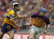 24 July 2005; Rory Jacob, Wexford, in action against Gerry Quinn, Clare. Guinness All-Ireland Senior Hurling Championship Quarter-Final, Wexford v Clare, Croke Park, Dublin. Picture credit; Damien Eagers / SPORTSFILE