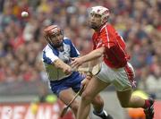 24 July 2005; Ronan Curran, Cork, is tackled by Seamus Prendergast, Waterford. Guinness All-Ireland Senior Hurling Championship Quarter-Final, Cork v Waterford, Croke Park, Dublin. Picture credit; Damien Eagers / SPORTSFILE