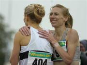 24 July 2005; Jolene Byrne, Donore Harriers A.C., left, is congratulated by Maria McCambridge, Dundrum South Dublin A.C., after winning the Women's 1500m final during the AAI National Track and Field Championships. Morton Stadium, Santry, Dublin. Picture credit; Pat Murphy / SPORTSFILE