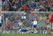 24 July 2005; Waterford goalkeeper Clinton Hennessy fails to save a shot by Cork's Brian Corcoran, right, for Cork's only goal late in the game. Guinness All-Ireland Senior Hurling Championship Quarter-Final, Cork v Waterford, Croke Park, Dublin. Picture credit; Brendan Moran / SPORTSFILE