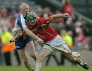 24 July 2005; Jerry O'Connor, Cork, is tackled by John Mullane, Waterford, in the closing minutes of the game. Waterford. Guinness All-Ireland Senior Hurling Championship Quarter-Final, Cork v Waterford, Croke Park, Dublin. Picture credit; Ray McManus / SPORTSFILE