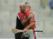 24 July 2005; Cork manager John Allen congratulates Brian Corcoran after victory over Waterford. Guinness All-Ireland Senior Hurling Championship Quarter-Final, Cork v Waterford, Croke Park, Dublin. Picture credit; Damien Eagers / SPORTSFILE