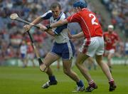 24 July 2005; Eoin Kelly, Waterford, is tackled by Pat Mulcahy, Cork. Guinness All-Ireland Senior Hurling Championship Quarter-Final, Cork v Waterford, Croke Park, Dublin. Picture credit; Ray McManus / SPORTSFILE