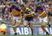 24 July 2005; Diarmuid McMahon, Clare, in action against David O'Connor and Diarmuid Lyng, Wexford. Guinness All-Ireland Senior Hurling Championship Quarter-Final, Wexford v Clare, Croke Park, Dublin. Picture credit; Brendan Moran / SPORTSFILE