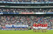 24 July 2005; Members of the Waterford and Cork teams stand for a minute silence in rememberance of Waterford girl Tara Delaney who was a victim of a recent terrorist bombing in Turkey. Guinness All-Ireland Senior Hurling Championship Quarter-Final, Cork v Waterford, Croke Park, Dublin. Picture credit; Brendan Moran / SPORTSFILE