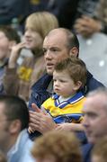 24 July 2005; Former Clare hurler Ollie Baker with his two year old son Senan at the game. Guinness All-Ireland Senior Hurling Championship Quarter-Final, Wexford v Clare, Croke Park, Dublin. Picture credit; Brendan Moran / SPORTSFILE