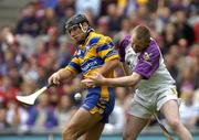 24 July 2005; Tony Carmody, Clare, in action against Damien Fitzhenry, Wexford. Guinness All-Ireland Senior Hurling Championship Quarter-Final, Wexford v Clare, Croke Park, Dublin. Picture credit; Damien Eagers / SPORTSFILE