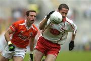 23 July 2005; Stephen O'Neill, Tyrone, in action against Enda McNulty, Armagh. Bank of Ireland Ulster Senior Football Championship Final Replay, Tyrone v Armagh, Croke Park, Dublin. Picture credit; Damien Eagers / SPORTSFILE