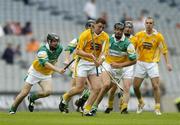 23 July 2005; Jim Connolly, Antrim, in action against Brendan Murphy, left, and Gary Hanniffy, Offaly. Guinness All-Ireland Senior Hurling Championship, Relegation Section, Semi-Final, Offaly v Antrim, Croke Park, Dublin. Picture credit; Brendan Moran / SPORTSFILE