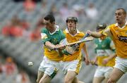 23 July 2005; Michael Cordial, Offaly, in action against Gerard Cunningham and Johnny Campbell, right, Antrim. Guinness All-Ireland Senior Hurling Championship, Relegation Section, Semi-Final, Offaly v Antrim, Croke Park, Dublin. Picture credit; Brendan Moran / SPORTSFILE