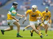 23 July 2005; Johnny McIntosh, Antrim, in action against Kevin Brady, Offaly. Guinness All-Ireland Senior Hurling Championship, Relegation Section, Semi-Final, Offaly v Antrim, Croke Park, Dublin. Picture credit; Brendan Moran / SPORTSFILE