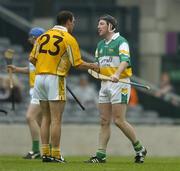 23 July 2005; Brian Whelahan, Offaly, shakes hands with Brian Herron, Antrim, after the final whistle. Guinness All-Ireland Senior Hurling Championship, Relegation Section, Semi-Final, Offaly v Antrim, Croke Park, Dublin. Picture credit; Brendan Moran / SPORTSFILE