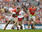 23 July 2005; Brian Mallon, Armagh, in action against Enda McGinley, Tyrone. Bank of Ireland Ulster Senior Football Championship Final Replay, Tyrone v Armagh, Croke Park, Dublin. Picture credit; Brendan Moran / SPORTSFILE