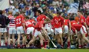 24 July 2005; The Cork players get ready for the team photograph. Guinness All-Ireland Senior Hurling Championship Quarter-Final, Cork v Waterford, Croke Park, Dublin. Picture credit; Brendan Moran / SPORTSFILE
