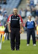 24 July 2005; Cork manager John Allen stands for the national anthem with Waterford manager Justin McCarthy in the background. Guinness All-Ireland Senior Hurling Championship Quarter-Final, Cork v Waterford, Croke Park, Dublin. Picture credit; Brendan Moran / SPORTSFILE