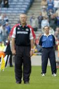 24 July 2005; Waterford manager Justin McCarthy stands for the national anthem with Cork manager John Allen in the foreground. Guinness All-Ireland Senior Hurling Championship Quarter-Final, Cork v Waterford, Croke Park, Dublin. Picture credit; Brendan Moran / SPORTSFILE