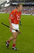 24 July 2005; Cork hurler Niall McCarthy walking in the parade sporting boots displaying an advertisement for an alcoholic beverage during the pre-match parade. Guinness All-Ireland Senior Hurling Championship Quarter-Final, Cork v Waterford, Croke Park, Dublin. Picture credit; Ray McManus / SPORTSFILE