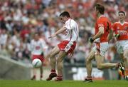 23 July 2005; Ryan McManamin, Tyrone, in action against Paul McGrane, Armagh. Bank of Ireland Ulster Senior Football Championship Final Replay, Tyrone v Armagh, Croke Park, Dublin. Picture credit; Brendan Moran / SPORTSFILE