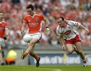 23 July 2005; Aaron Kernan, Armagh, in action against Brian Dooher, Tyrone. Bank of Ireland Ulster Senior Football Championship Final Replay, Tyrone v Armagh, Croke Park, Dublin. Picture credit; Brendan Moran / SPORTSFILE