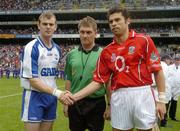 24 July 2005; Waterford captain Eoin Kelly, left, shakes hands with Cork captain Sean Og O hAilpin in the company of match referee Barry Kelly. Guinness All-Ireland Senior Hurling Championship Quarter-Final, Cork v Waterford, Croke Park, Dublin. Picture credit; Ray McManus / SPORTSFILE