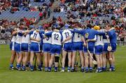 24 July 2005; The Waterford team form a huddle before the match. Guinness All-Ireland Senior Hurling Championship Quarter-Final, Cork v Waterford, Croke Park, Dublin. Picture credit; Ray McManus / SPORTSFILE