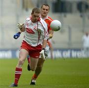 23 July 2005; Gavin Devlin, Tyrone, in action against John McEntee, Armagh. Bank of Ireland Ulster Senior Football Championship Final Replay, Tyrone v Armagh, Croke Park, Dublin. Picture credit; Damien Eagers / SPORTSFILE