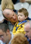 24 July 2005; Former Clare hurler Ollie Baker with his 2 year old son Senan at the game. Guinness All-Ireland Senior Hurling Championship Quarter-Final, Wexford v Clare, Croke Park, Dublin. Picture credit; Brendan Moran / SPORTSFILE