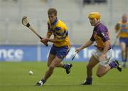 24 July 2005; Brian O'Connell, Clare, in action against Rory McCarthy, Wexford. Guinness All-Ireland Senior Hurling Championship Quarter-Final, Wexford v Clare, Croke Park, Dublin. Picture credit; Damien Eagers / SPORTSFILE