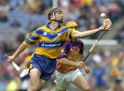 24 July 2005; Tont Griffin, Clare, in action against Rory McCarthy, Wexford. Guinness All-Ireland Senior Hurling Championship Quarter-Final, Wexford v Clare, Croke Park, Dublin. Picture credit; Brendan Moran / SPORTSFILE